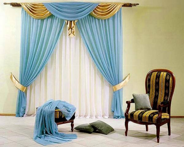 Как правильно использовать синие шторы в интерьере помещения? - фото